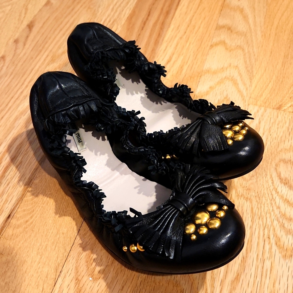 Miu Miu ballet flats size 38.5. Black with fringe and gold studs.